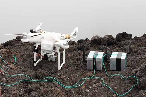 The drone sat alongside the silver 'dragon eggs' at the top of the Stromboli volcano in Italy.